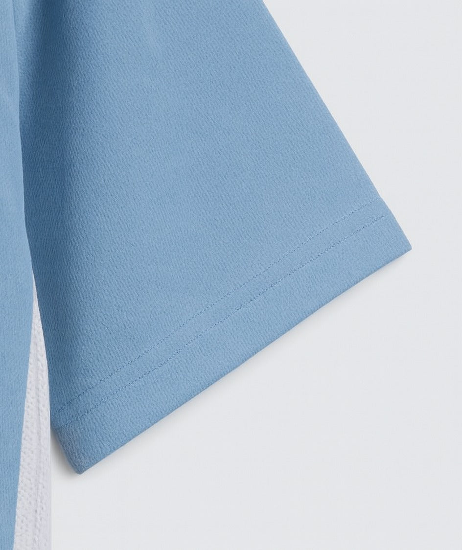 Manchester City 2011/12 home shirt — sleeve and cuff close-up