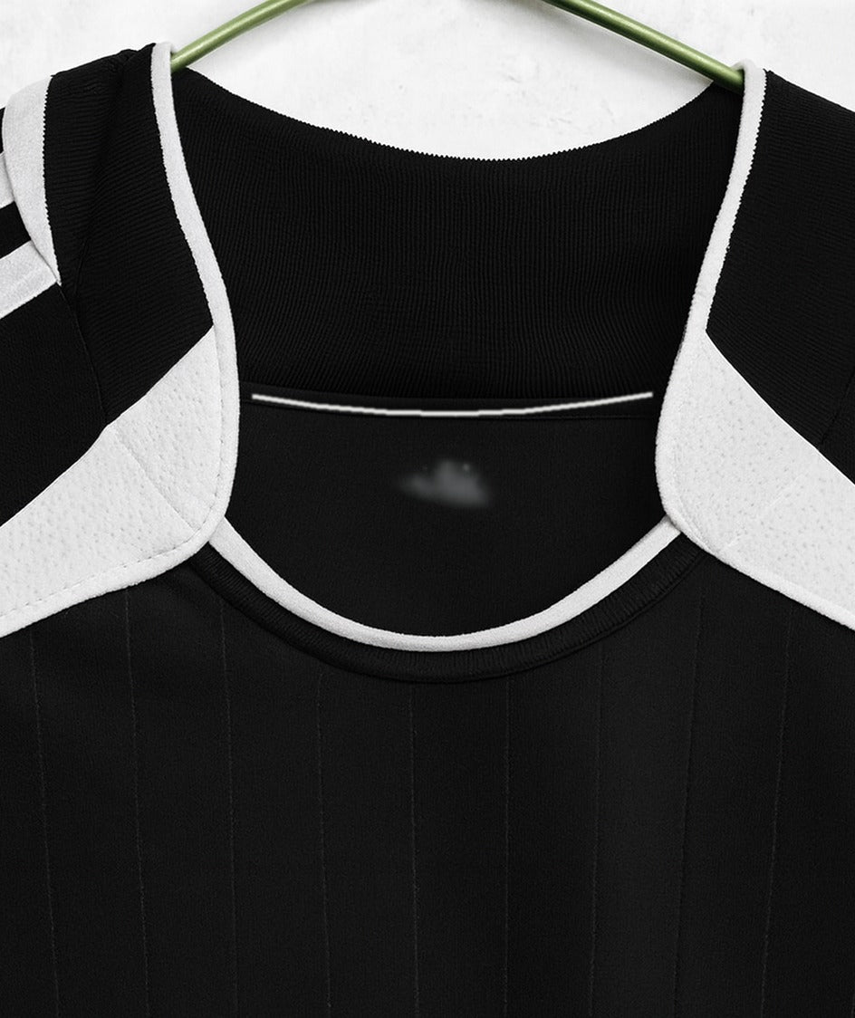 Real Madrid 2006/07 away shirt — collar close-up