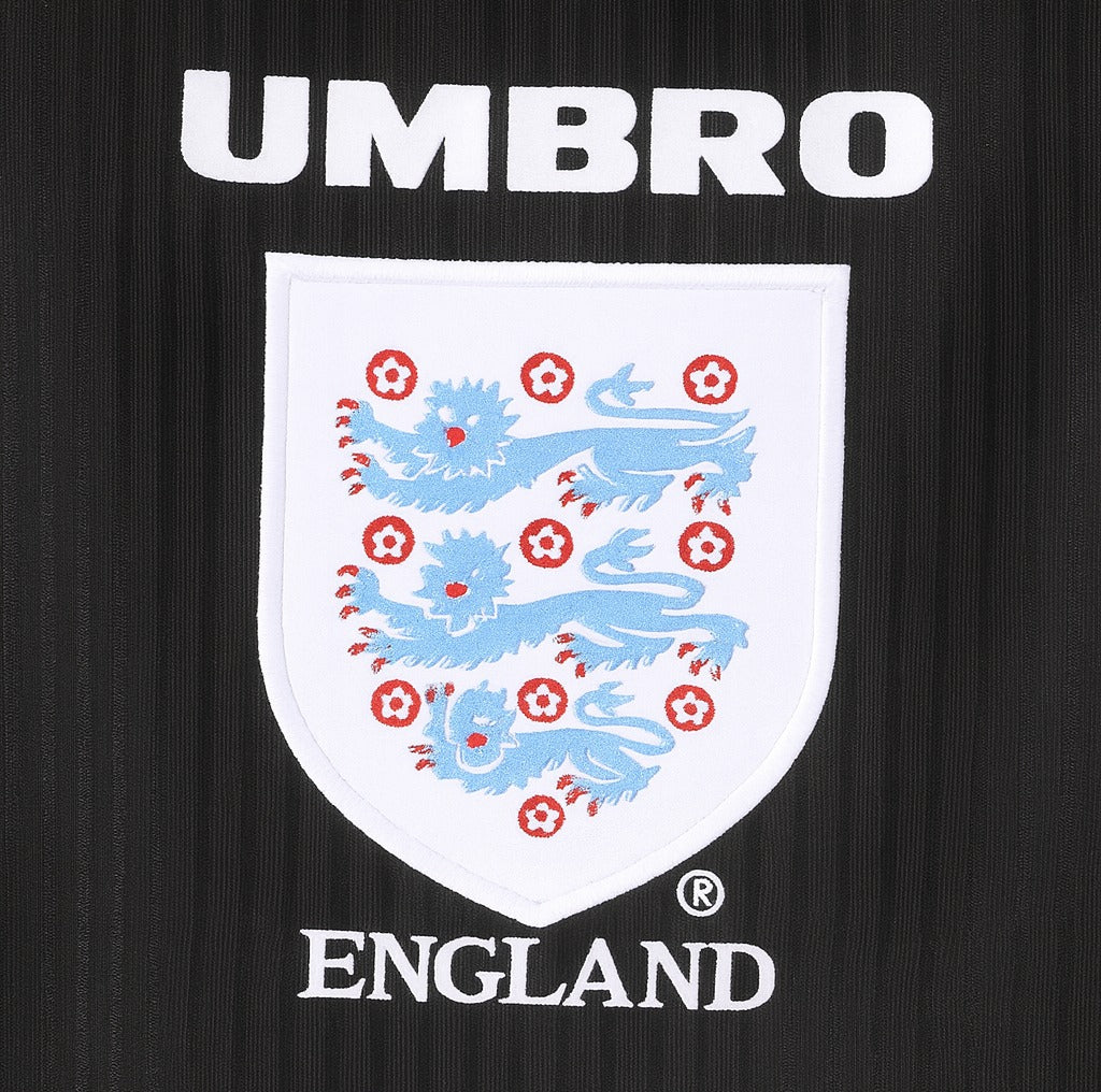 England 1998 black away shirt — Three Lions crest close-up