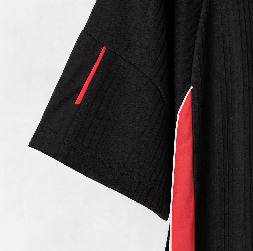 England 1998 black away shirt — sleeve and cuff close-up
