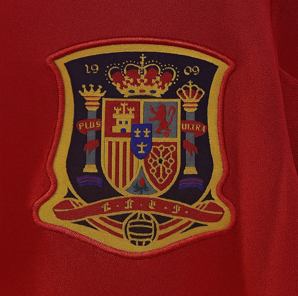 Spain 2010 home shirt — RFEF crest close-up