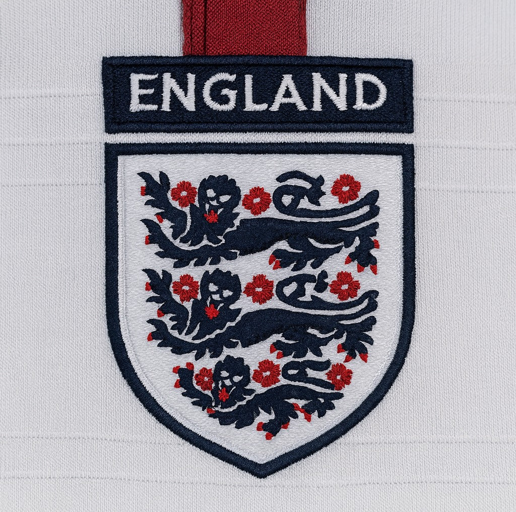England 2004 home shirt — team crest close-up