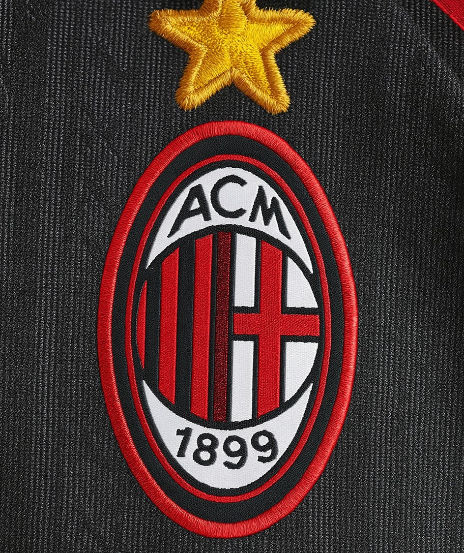 AC Milan 1997/98 black away shirt — club crest close-up
