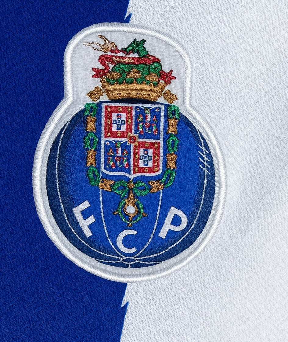 FC Porto 2010/11 home shirt — club crest close-up