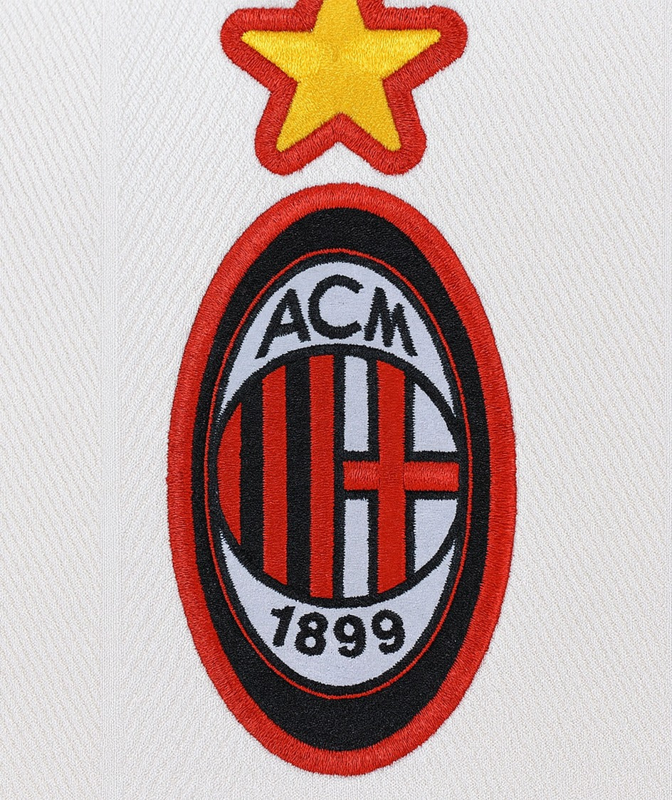 AC Milan 1997/98 white away shirt — club crest close-up