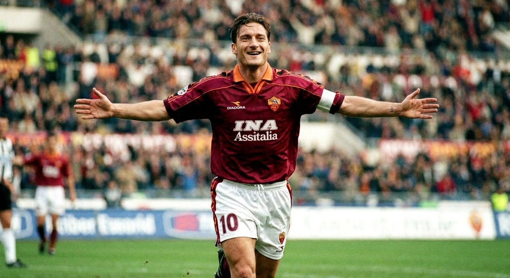 Francesco Totti celebrating in the AS Roma 1998/99 home shirt