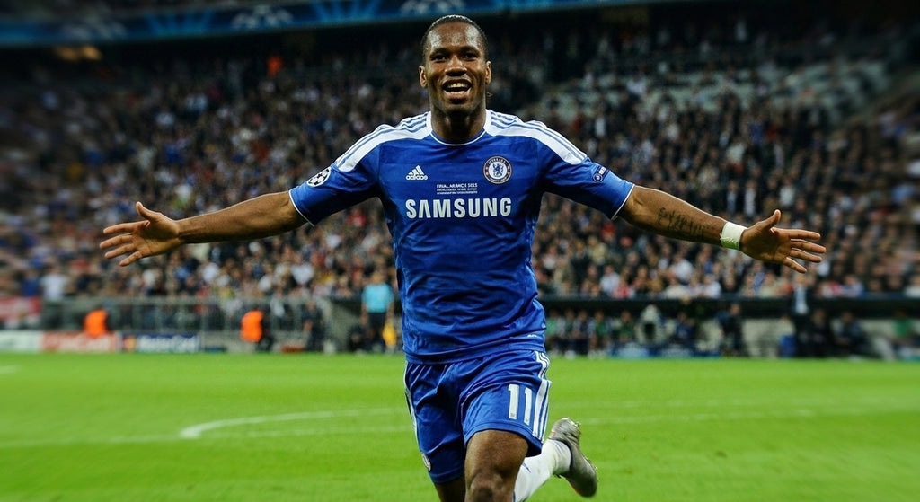 Didier Drogba celebrating in the Chelsea 2011/12 home shirt