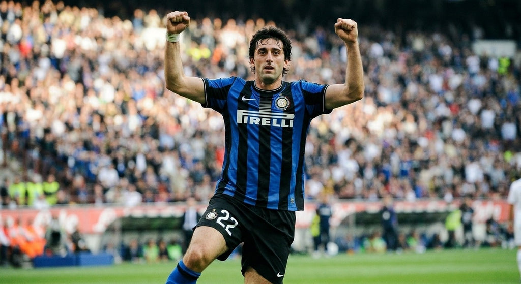 Diego Milito celebrating in the Inter 2010/11 home shirt
