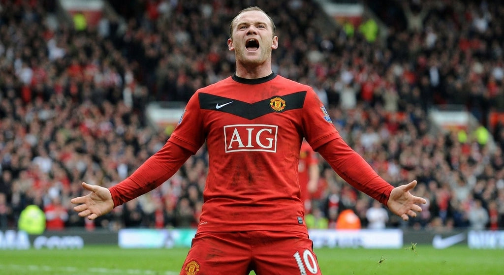 Wayne Rooney celebrating in the Manchester United 2009/10 home shirt
