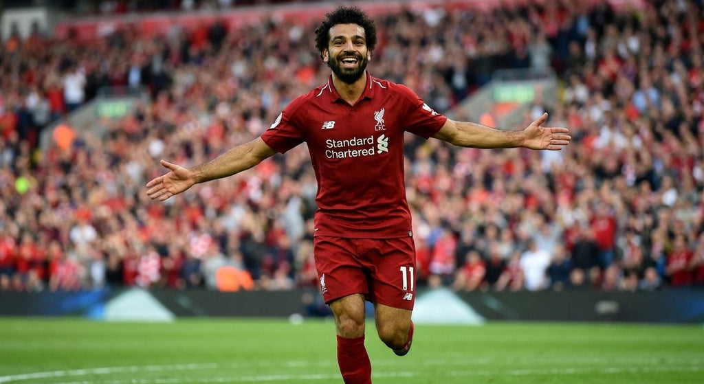 Mohamed Salah celebrating in the Liverpool 2018/19 home shirt