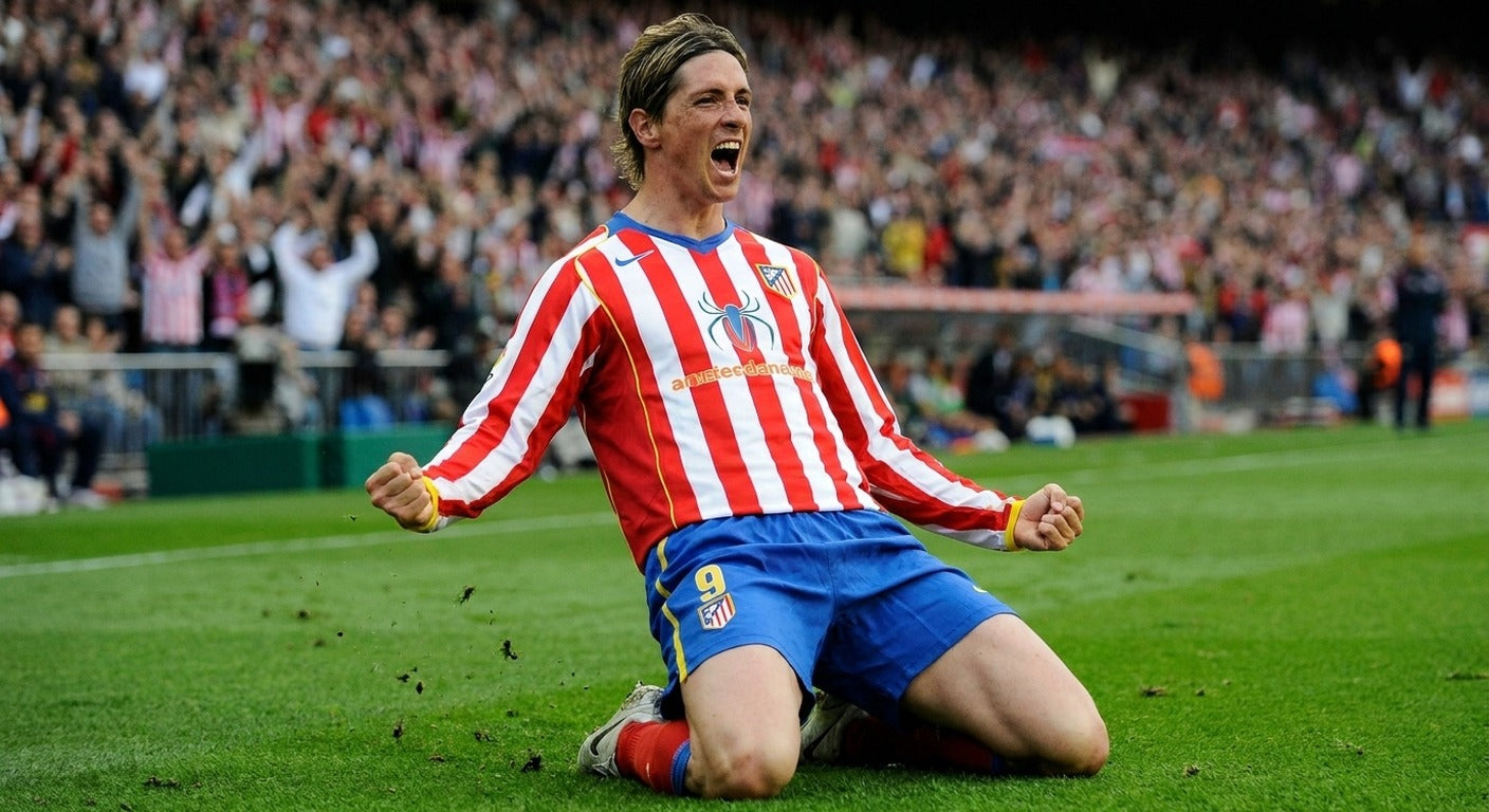 Fernando Torres celebrating in the Atletico Madrid 2004/05 home shirt