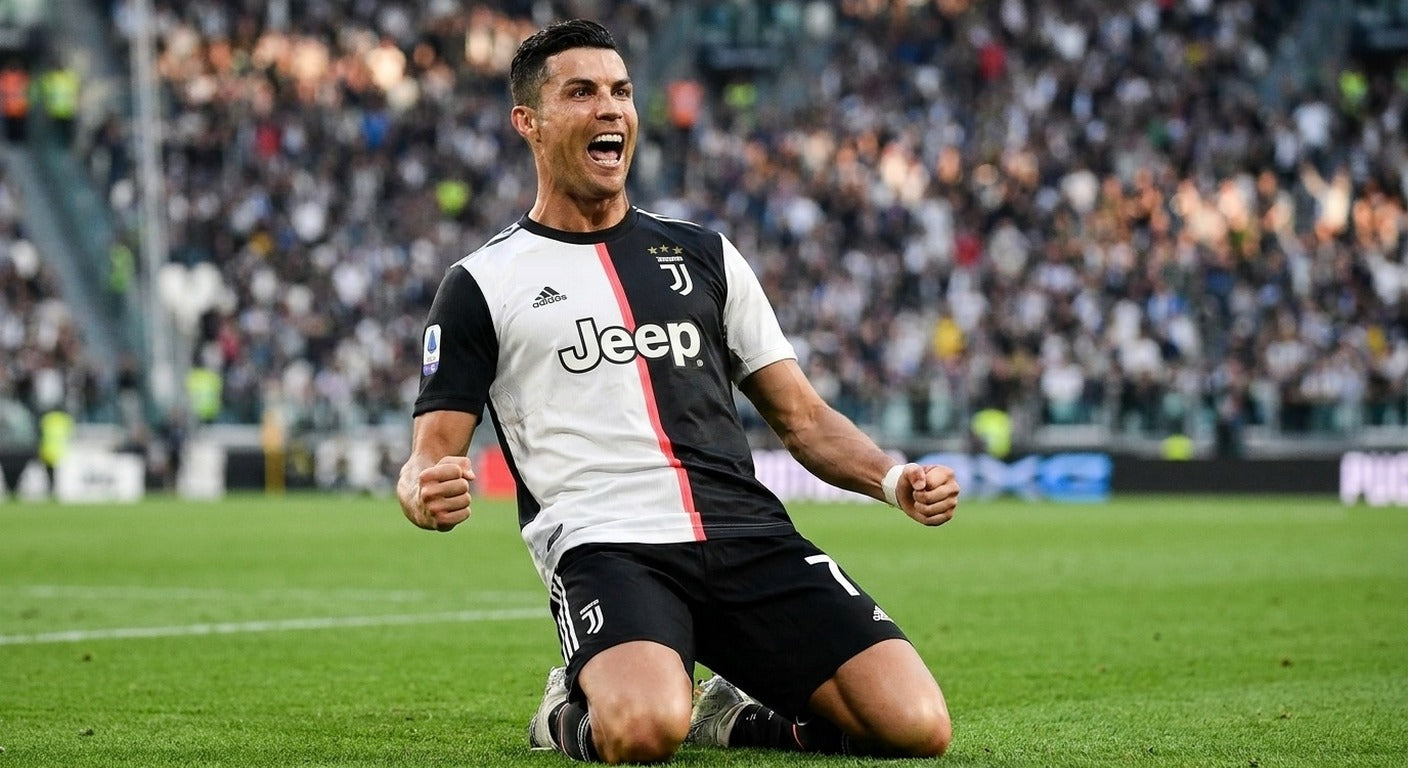 Cristiano Ronaldo celebrating in the Juventus 2019/20 home shirt