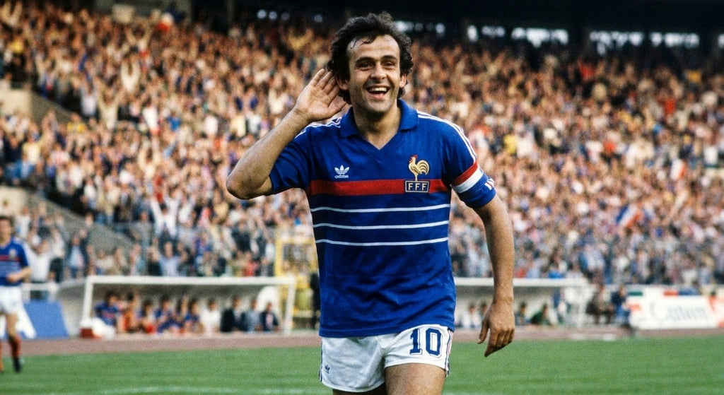 Michel Platini celebrating in the France 1984 home shirt