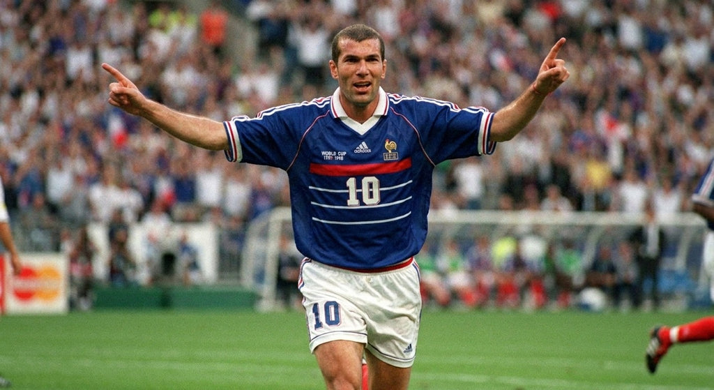 Zinedine Zidane celebrating in the France 1998 home shirt