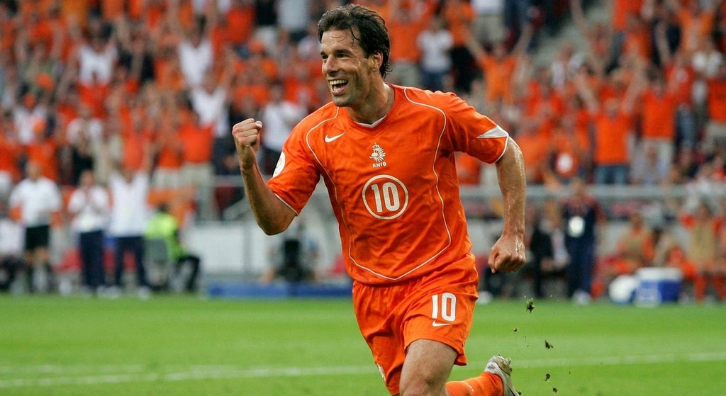 Ruud van Nistelrooy celebrating in the Netherlands 2004 home shirt