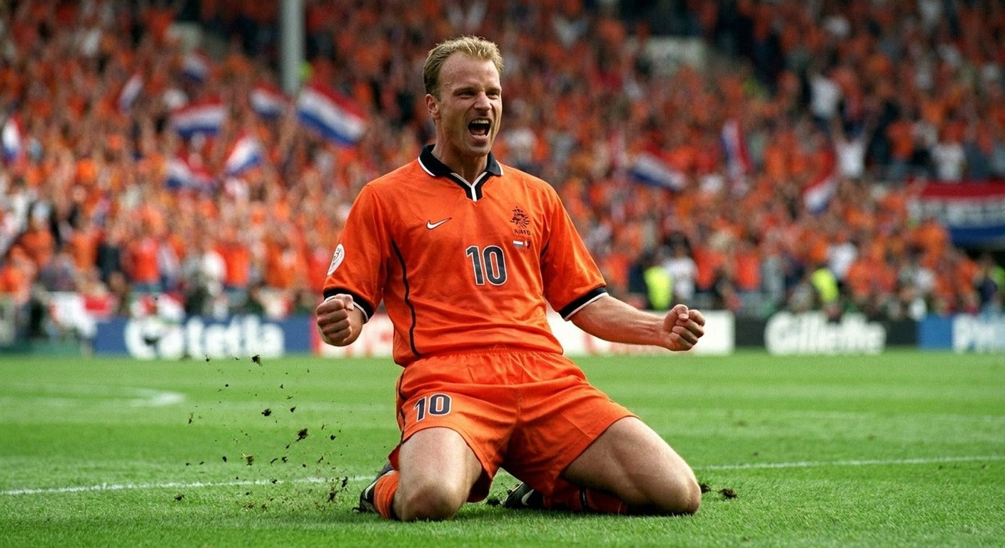 Dennis Bergkamp celebrating in the Netherlands 1998 home shirt
